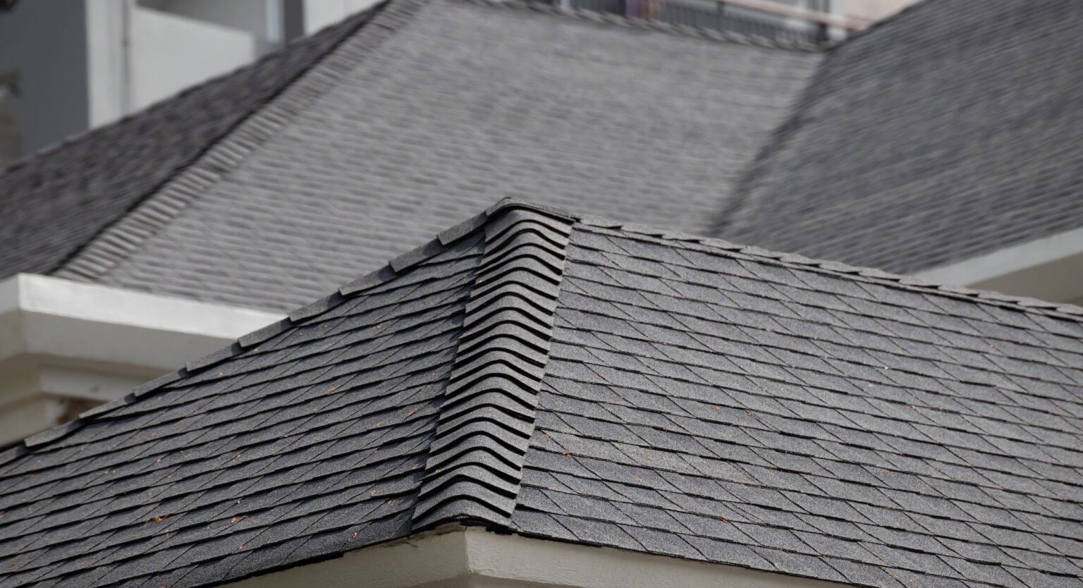 roof shingle background and texture. dark asphalt tiles on the roof. Roof Replacement Portland OR 1536x834 1